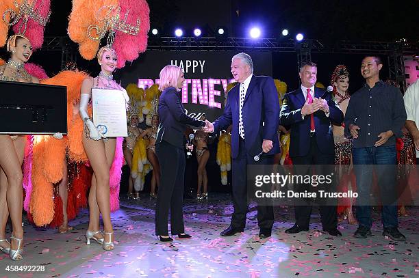 Singer Britney Spears, Clark County Commissioner Steve Sisolak, Regional President of Planet Hollywood Resort & Casino, Bally's Las Vegas and Paris...