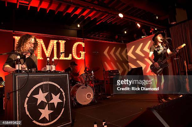 Kelby Ray, Neil Mason, and Jaren Johnston of The Cadillac Three perform at the Big Machine Label Group Celebrates The 48th Annual CMA Awards in...
