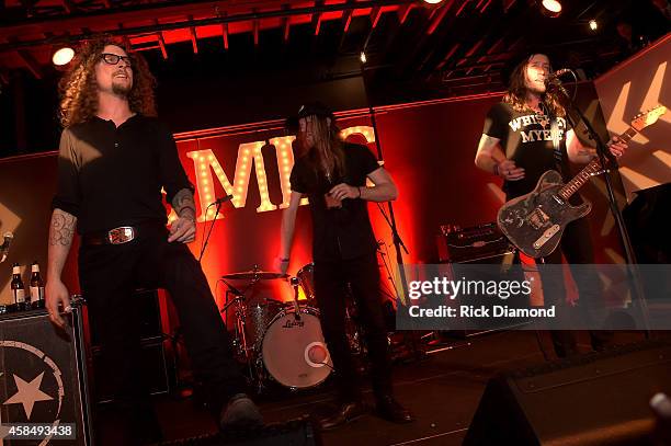 Kelby Ray, Neil Mason, and Jaren Johnston of The Cadillac Three perform at the Big Machine Label Group Celebrates The 48th Annual CMA Awards in...