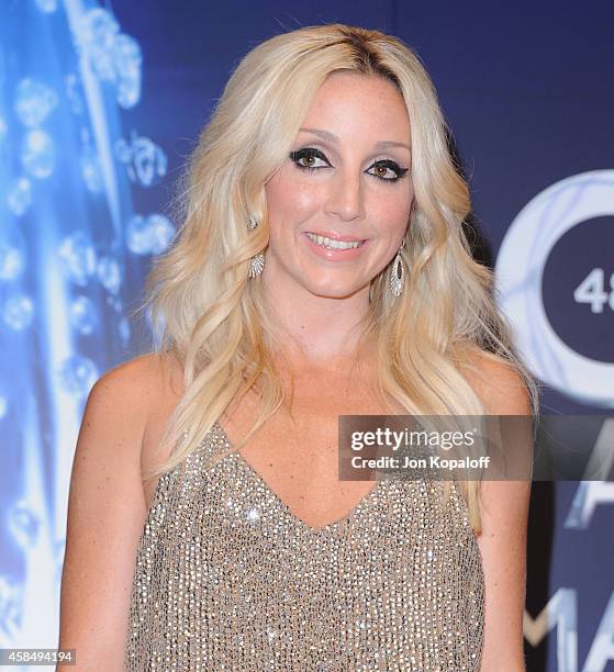 Singer Ashley Monroe poses in the press room at the 48th annual CMA Awards at the Bridgestone Arena on November 5, 2014 in Nashville, Tennessee.