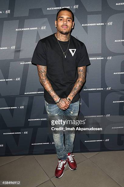 Recording artist Chris Brown attends the Alexander Wang x H&M Pre-Shop Party at H&M on November 5, 2014 in West Hollywood, California.