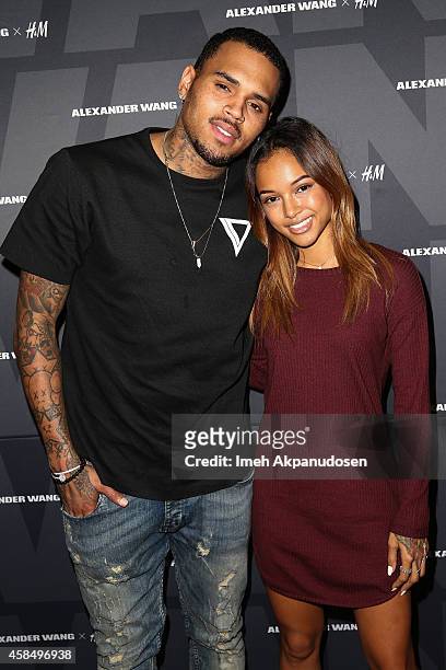 Recording artist Chris Brown and model Karrueche Tran attend the Alexander Wang x H&M Pre-Shop Party at H&M on November 5, 2014 in West Hollywood,...