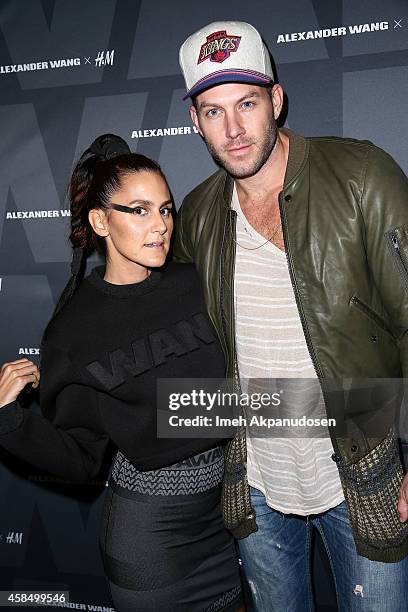 Nikki Pennie and stylist Johnny Wujek attend the Alexander Wang x H&M Pre-Shop Party at H&M on November 5, 2014 in West Hollywood, California.