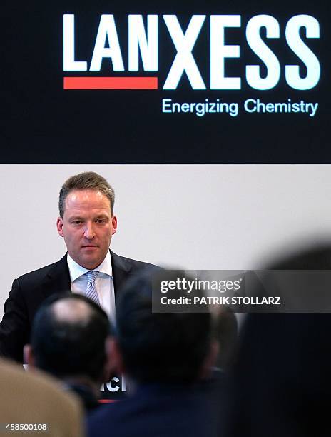 Of chemical company Lanxess AG Matthias Zachert answers questions during a media day press conference at the company's headquarters on November 6,...