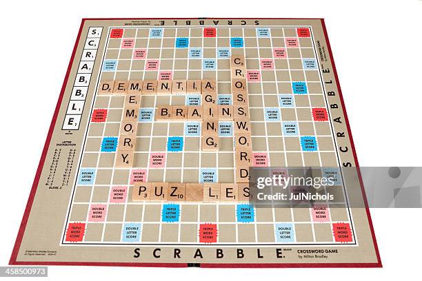 aging brain concept on scrabble board - scrabble stockfoto's en -beelden