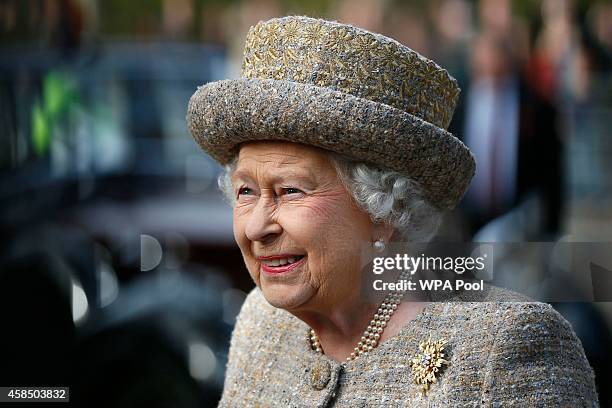 Queen Elizabeth II arrives before the Opening of the Flanders' Fields Memorial Garden at Wellington Barracks on November 6, 2014 in London, England.