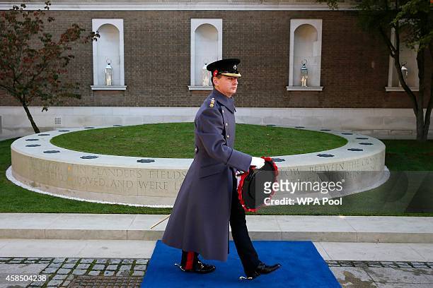 British soldier walks past the Flanders' Fields Memorial Garden before it was the opened at Wellington Barracks on November 6, 2014 in London,...