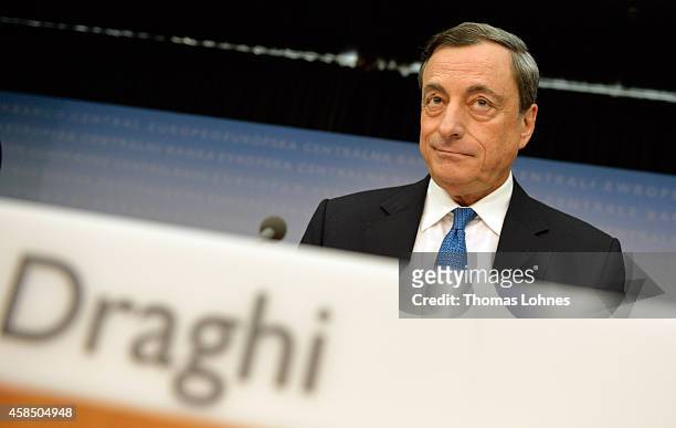 Mario Draghi, President of the European Central Bank, speaks to the media following the monthly ECB board meeting on November 6, 2014 in Frankfurt,...