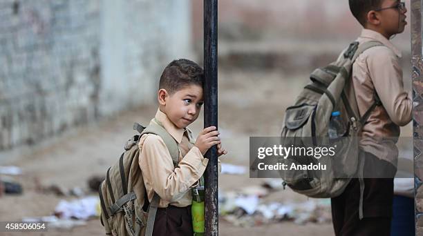 An Egyptian student goes to a primary school, where nearly 2 thousand students get education, in Baragil neighborhood of Giza, Egypt on October 30,...