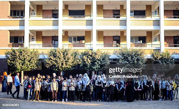 Egyptian students are seen at the garden of a primary school, where nearly 2 thousand students get education, after the Egyptian national anthem...