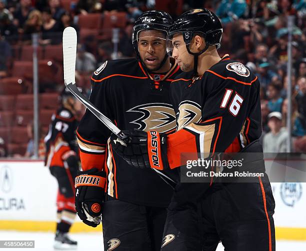 Devante Smith-Pelly and Emerson Etem of the Anaheim Ducks talk during the game against the San Jose Sharks on October 26, 2014 at Honda Center in...