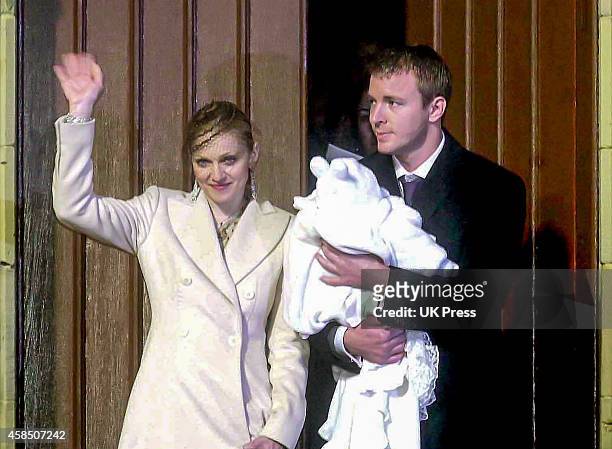 Madonna, and Guy Ritchie, with their son Rocco, at Rocco's Christening Ceremony, at Dornoch Cathedral, in Scotland. On December 21, 2000 in, Dornoch,...