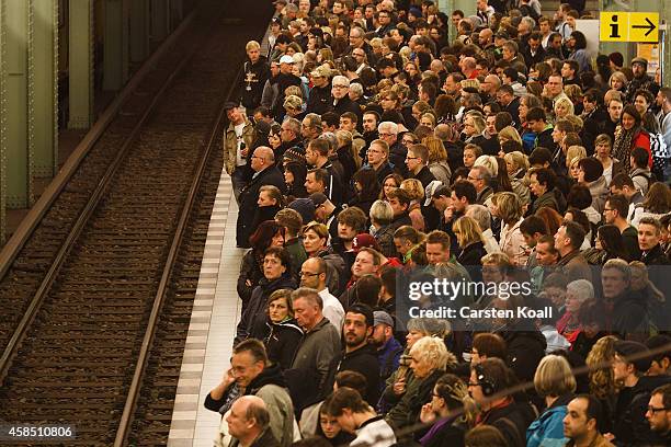 Passengers crowd the platform as they wait for the subway train retracted U5 line at the station Alexanderplatz during a four-day strike by the GDL...