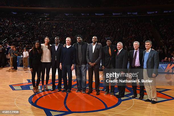 The NBA All-Star Relay Team from the TCS New York City Marathon gets introduced during the game between the New York Knicks and Charlotte Hornets on...