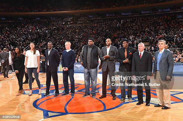 The NBA All-Star Relay Team from the TCS New York City Marathon gets introduced during the game between the New York Knicks and Charlotte Hornets on...