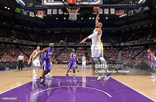 Marreese Speights of the Golden State Warriors dunks against the Sacramento Kings on October 29, 2014 at Sleep Train Arena in Sacramento, California....