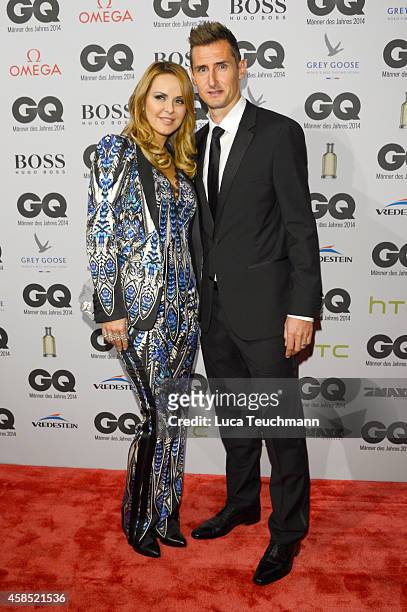 Miroslav Klose and his wife Sylwia arrive at the GQ Men of the Year Award 2014 at Komische Oper on November 6, 2014 in Berlin, Germany.