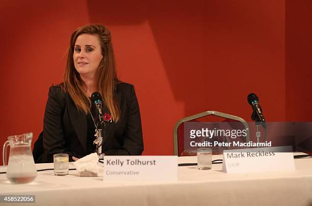 Rochester And Strood by-election candidate Conservative Kelly Tolhurst sits next to an empty seat reserved for United Kingdom Independence Party...