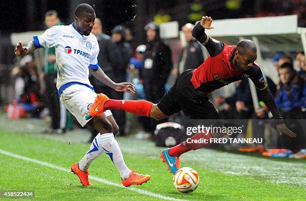 Guingamp's French-Guinean defender Baissama Sankoh vies for the ball with Dinamo Minsk's Ivorian forward Dja Djedje Frank during the UEFA Europa...