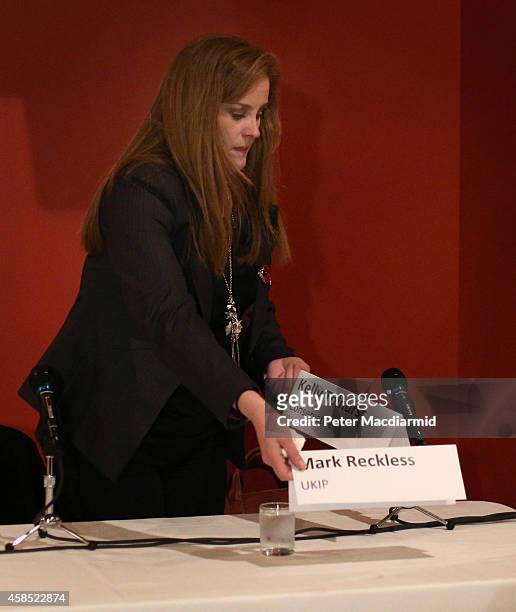 Rochester And Strood by-election candidate Conservative Kelly Tolhurst re-arranges name cards after United Kingdom Independence Party candidate Mark...