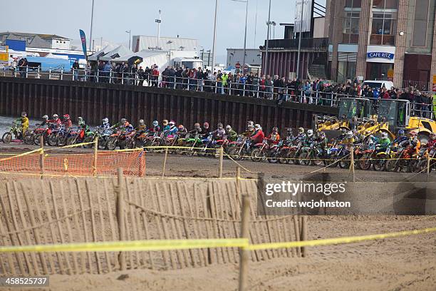 motorcycle motocross dirt bike race on the beach at weymouth - weymouth esplanade stock pictures, royalty-free photos & images