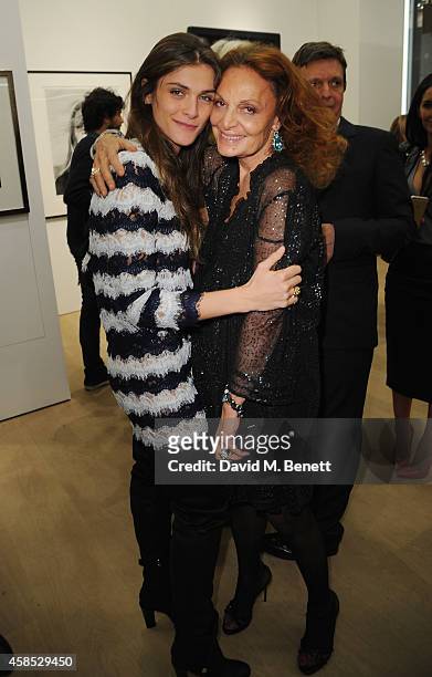 Elisa Sednaoui and Diane Von Furstenberg at the "Diane Von Furstenberg: Journey Of A Dress" exhibition at Phillips Gallery on November 6, 2014 in...