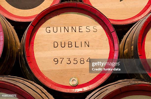 guiness beer barrel in close up - guinness stock pictures, royalty-free photos & images