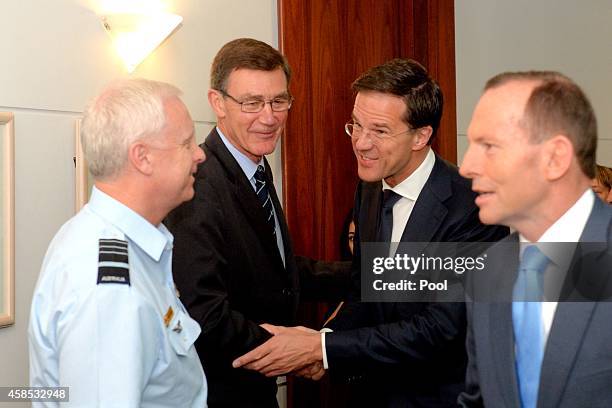 Netherlands Prime Minister Mark Rutte greets the Australian Chief of the Defence Force Air Chief Marshal Mark Binskin and Prime Minister's special...