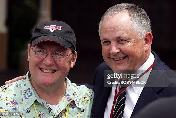 John Lasseter , founder and creative frontman of Pixar animation, poses with Walt Disney Studios Chairman Dick Cook , 04 May 2005 at the 50th...