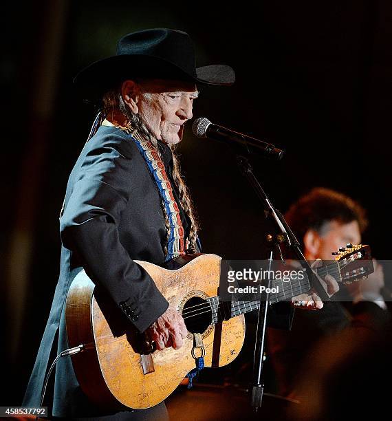 Singer Willie Nelson performs at "A Salute to the Troops: In Performance at the White House" on the South Lawn November 6, 2014 in Washington, DC....