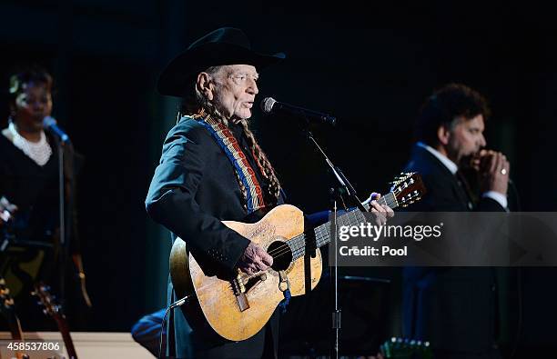 Singer Willie Nelson performs at "A Salute to the Troops: In Performance at the White House" on the South Lawn November 6, 2014 in Washington, DC....