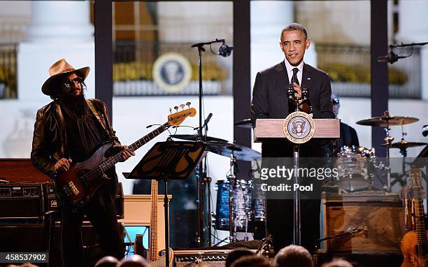 President Barack Obama speaks at "A Salute to the Troops: In Performance at the White House" on the South Lawn November 6, 2014 in Washington, DC....
