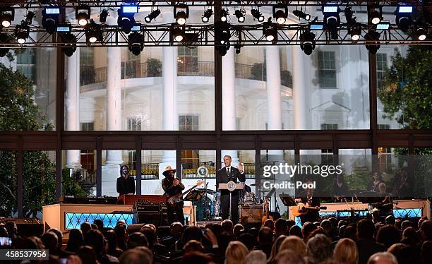 President Barack Obama speaks at "A Salute to the Troops: In Performance at the White House" on the South Lawn November 6, 2014 in Washington, DC....