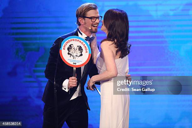 Joko Winterscheidt and Iris Berben are seen on stage at the GQ Men Of The Year Award 2014 at Komische Oper on November 6, 2014 in Berlin, Germany.