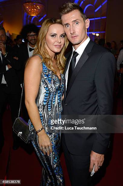 Miroslav Klose and his wife Sylwia are seen at the after show party of the GQ Men Of The Year Award 2014 after show party at Komische Oper on...