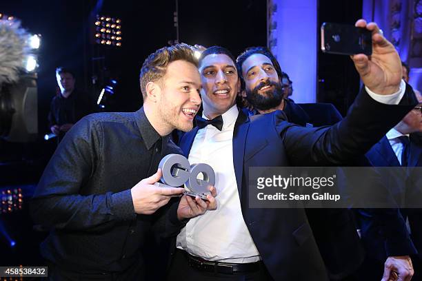 Olly Murs , Andreas Bourani and Adrien Brody are seen on stage at the GQ Men Of The Year Award 2014 at Komische Oper on November 6, 2014 in Berlin,...