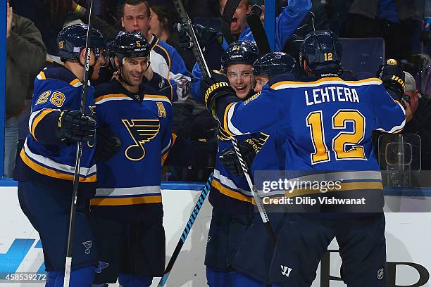 Vladimir Tarasenko of the St. Louis Blues celebrates his goal against the New Jersey Devils with Ian Cole, Barret Jackman also of the St. Louis Blues...