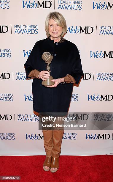 Martha Stewart poses with an award backstage at the 2014 Health Hero Awards hosted by WebMD at Times Center on November 6, 2014 in New York City.