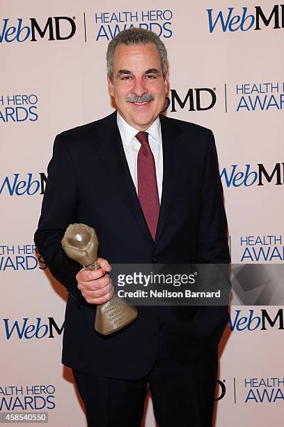 Honoree Dr. Harold S. Koplewicz poses with an award backstage at the 2014 Health Hero Awards hosted by WebMD at Times Center on November 6, 2014 in...