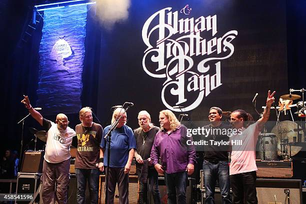 Jaimoe, Derek Trucks, Butch Trucks, Gregg Allman, Warren Haynes, Oteil Burbridge, and Marc Quinones of the Allman Brothers Band take a final bow at...