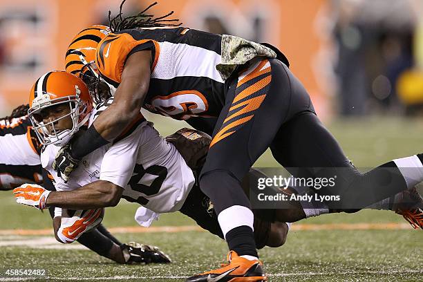 Emmanuel Lamur of the Cincinnati Bengals tackles Taylor Gabriel of the Cleveland Browns during the second quarter at Paul Brown Stadium on November...