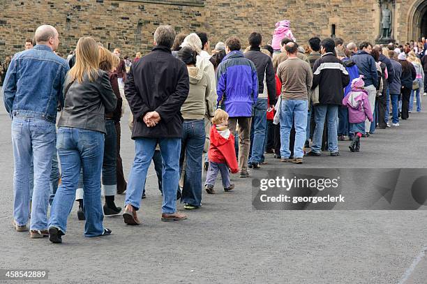 long queue of people - edinburgh castle people stock pictures, royalty-free photos & images