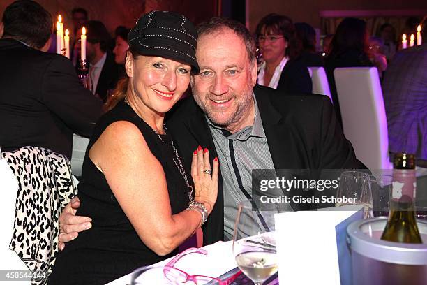 Harold Faltermeyer and his girlfriend Birgitt Wolff attend the Cotton Club Dinnershow - Premiere at Ungerer Bad on November 6, 2014 in Munich,...