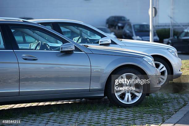 two mercedes-benz c200 avantgarde limousines - side by side stock pictures, royalty-free photos & images