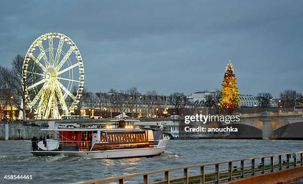 tourboat on seine river, paris - paris christmas stock pictures, royalty-free photos & images