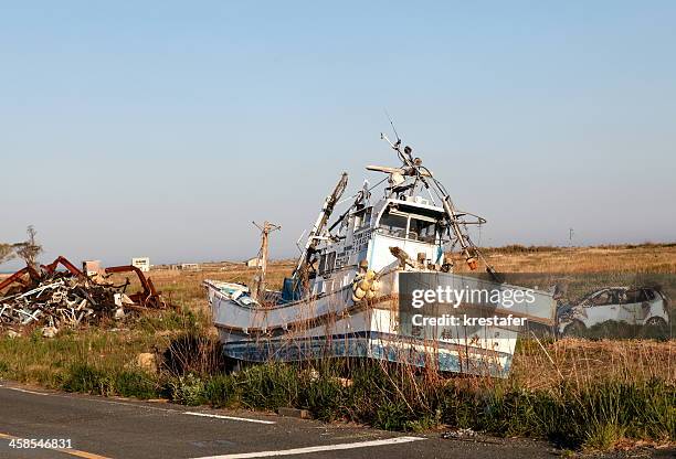 tsunami boot auf dem land - fukushima stock-fotos und bilder