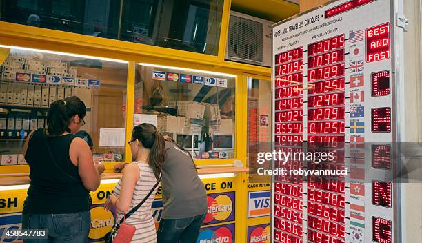 money exchange counter - bank counter stock pictures, royalty-free photos & images