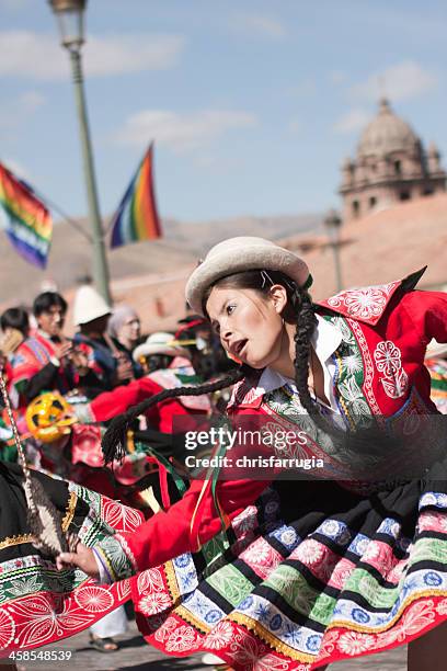 young woman dancing during cusco parade - inti raymi festival stock pictures, royalty-free photos & images