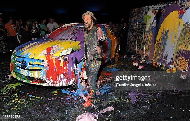 Artist Mr. Brainwash aka MBW attends the Mercedes-Benz Evolution Tour with Alabama Shakes & Young the Giant at The Barker Hangar on November 6, 2014...