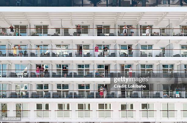 cruise ship passengers on balconies - panama canal and cruise stock pictures, royalty-free photos & images